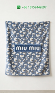 Miumiu Throw Blankets